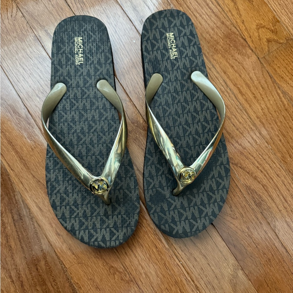 Michael Kors Black and Gold Flip Flops